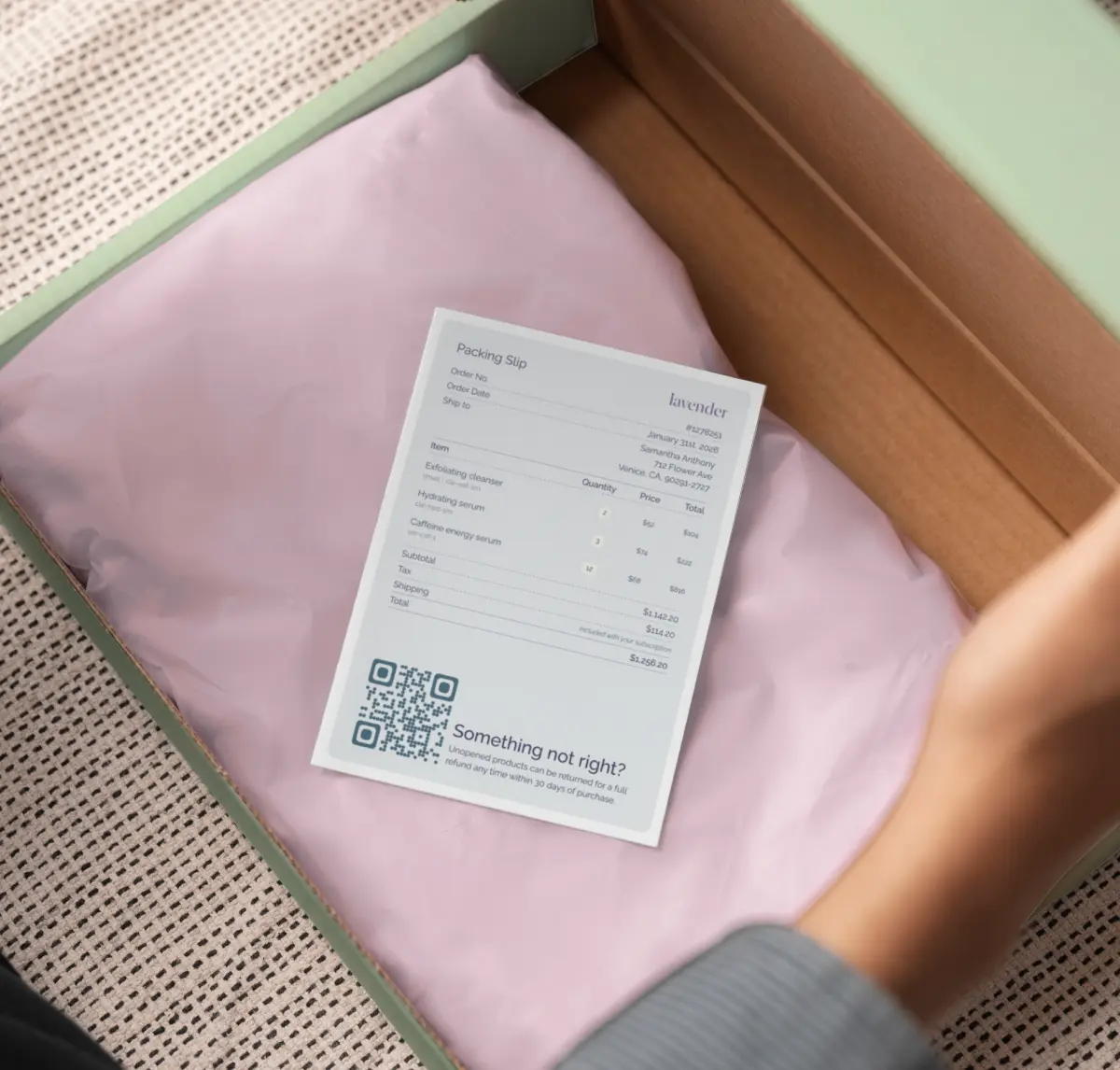 A packing slip with a prominent QR code and a "something's not right?" triage prompt